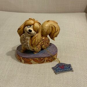 Jim Shore Disney Traditions - “Flirtatious Peg”
